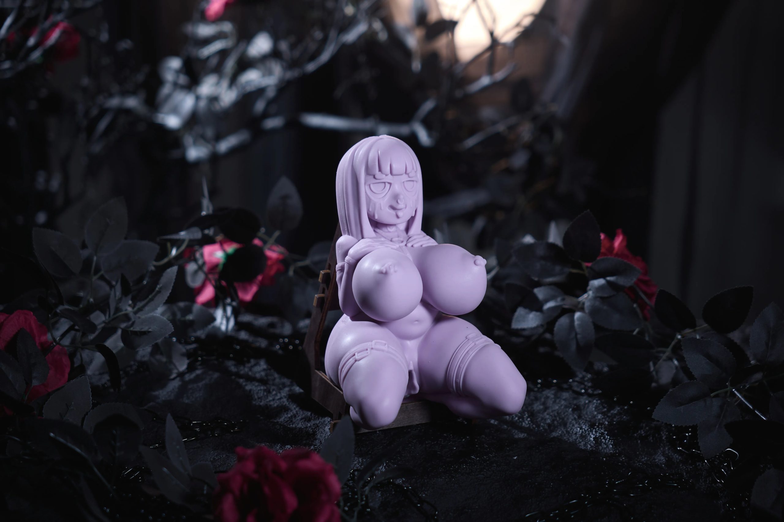 Koko goth sex doll — close-up bust detail, medical silicone