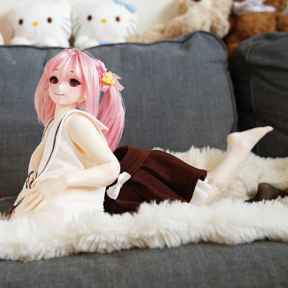 Sweet Lolita anime doll clothes styled in a soft bedroom display scene