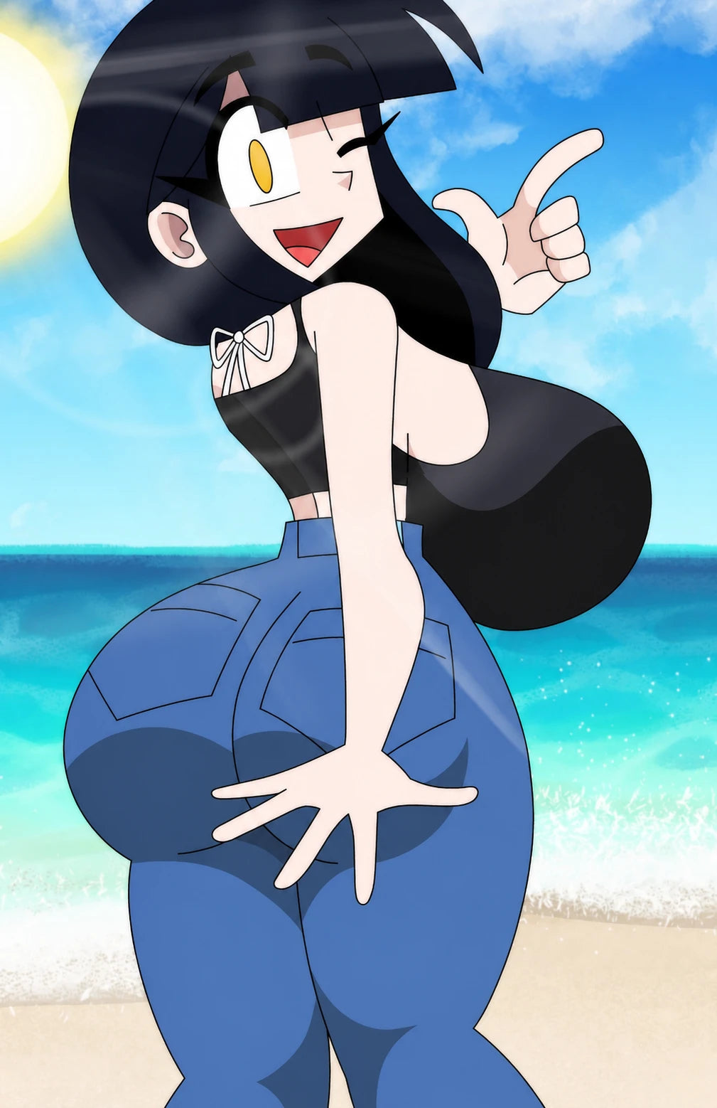 Audrey wearing a black top and jeans at the beach