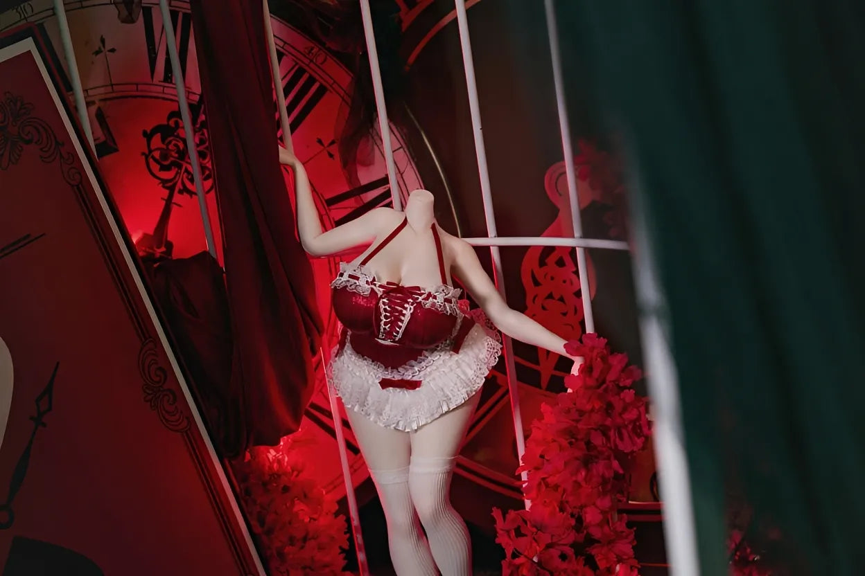 Close-up of red lace-up maid lingerie outfit on anime sex doll body